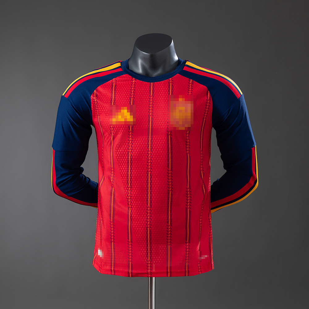 1ª EQUIPACIÓN ESPAÑA 2026 VERSIÓN JUGADOR MANGA LARGA (RÉPLICA)