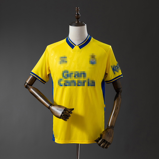 1ª EQUIPACIÓN UD LAS PALMAS 25/26 (RÉPLICA)
